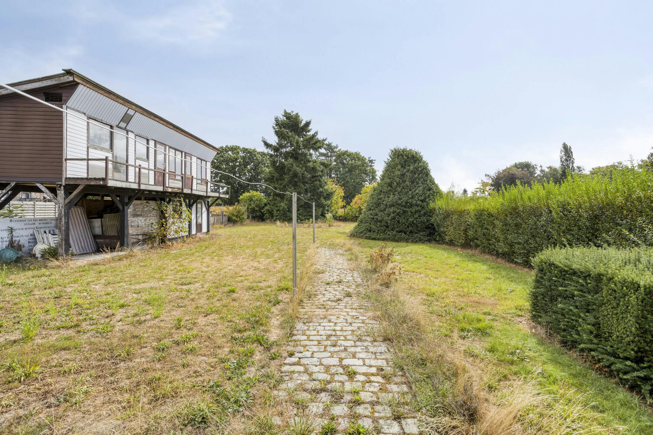 Te renoveren woning te koop net buiten het centrum van Retie foto 30