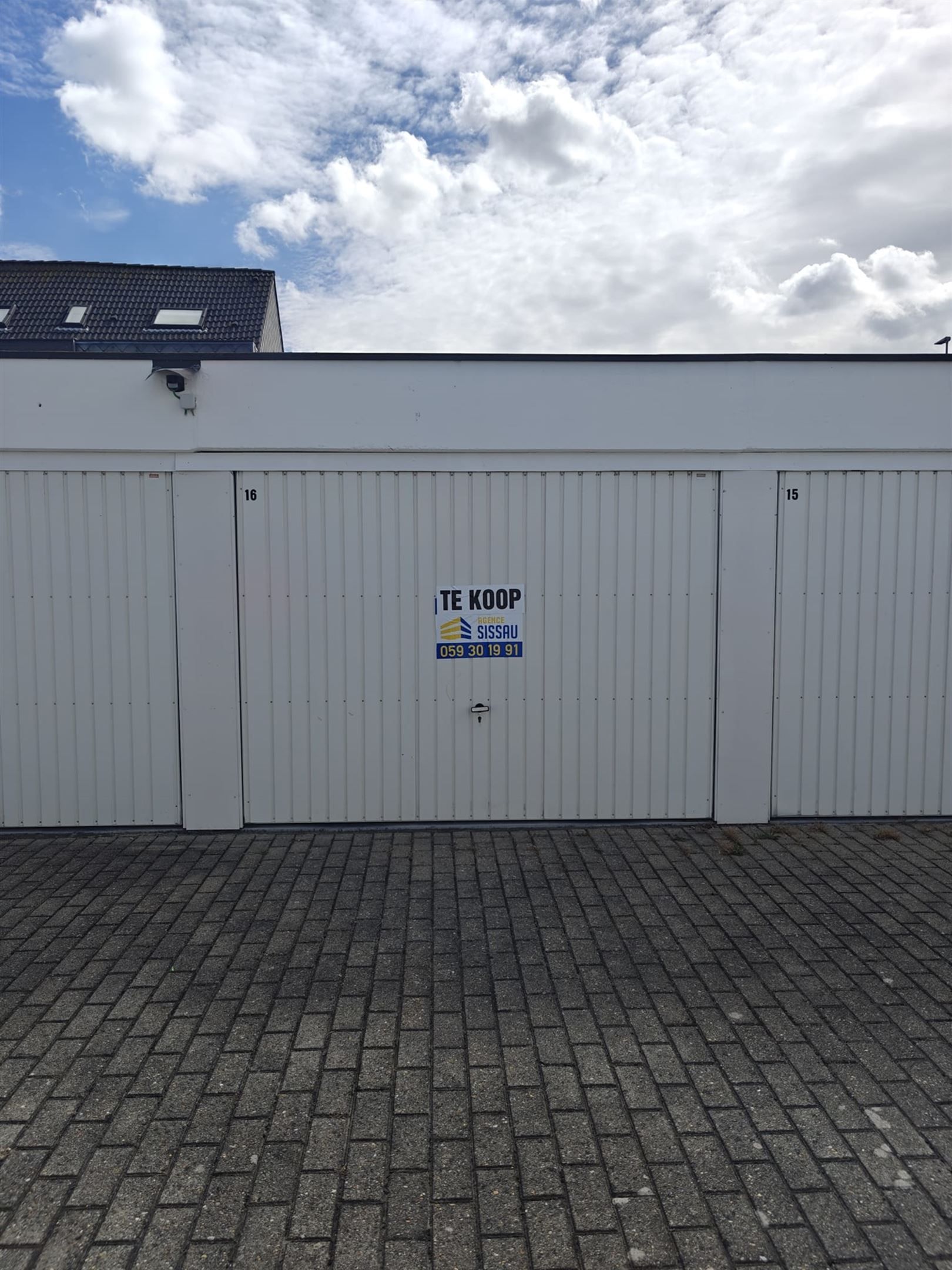 garage box foto {{pictureIndex}}