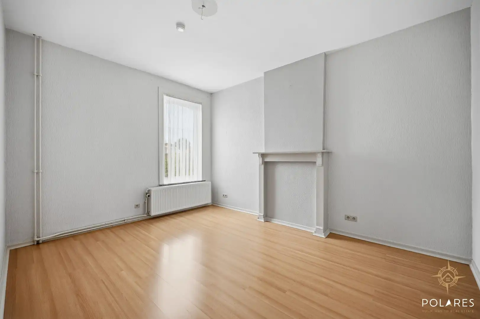 Instapklare rijwoning met 4 slaapkamers en leuke tuin! foto 12