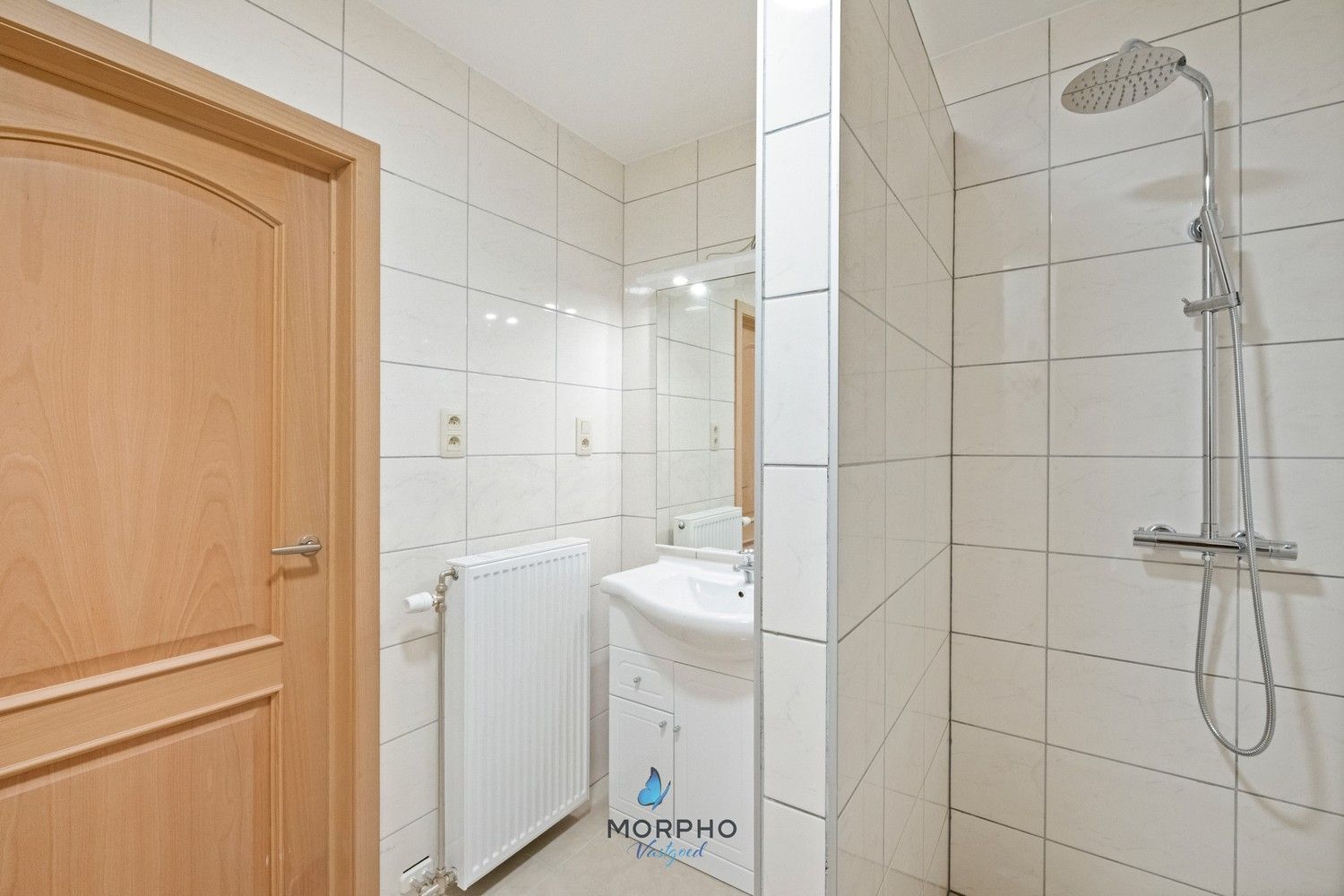 Modern en energiezuinig 2-slaapkamerappartement op de derde verdieping in hartje Temse! foto 13