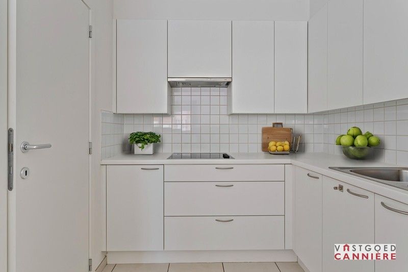 Ruim 2 slaapkamer appartement TE KOOP in residentie Den Hert in hartje Oostrozebeke! foto 9