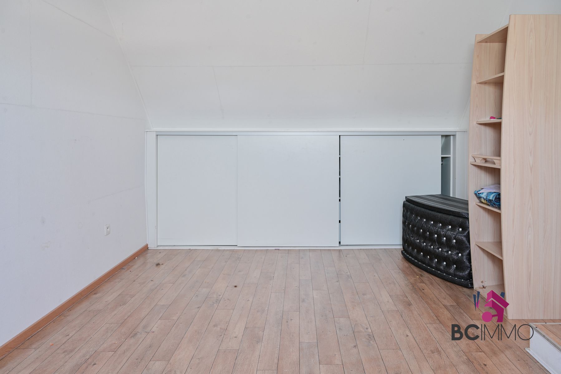 Handelswoonst met een triplex appartement te koop in Genk foto 15