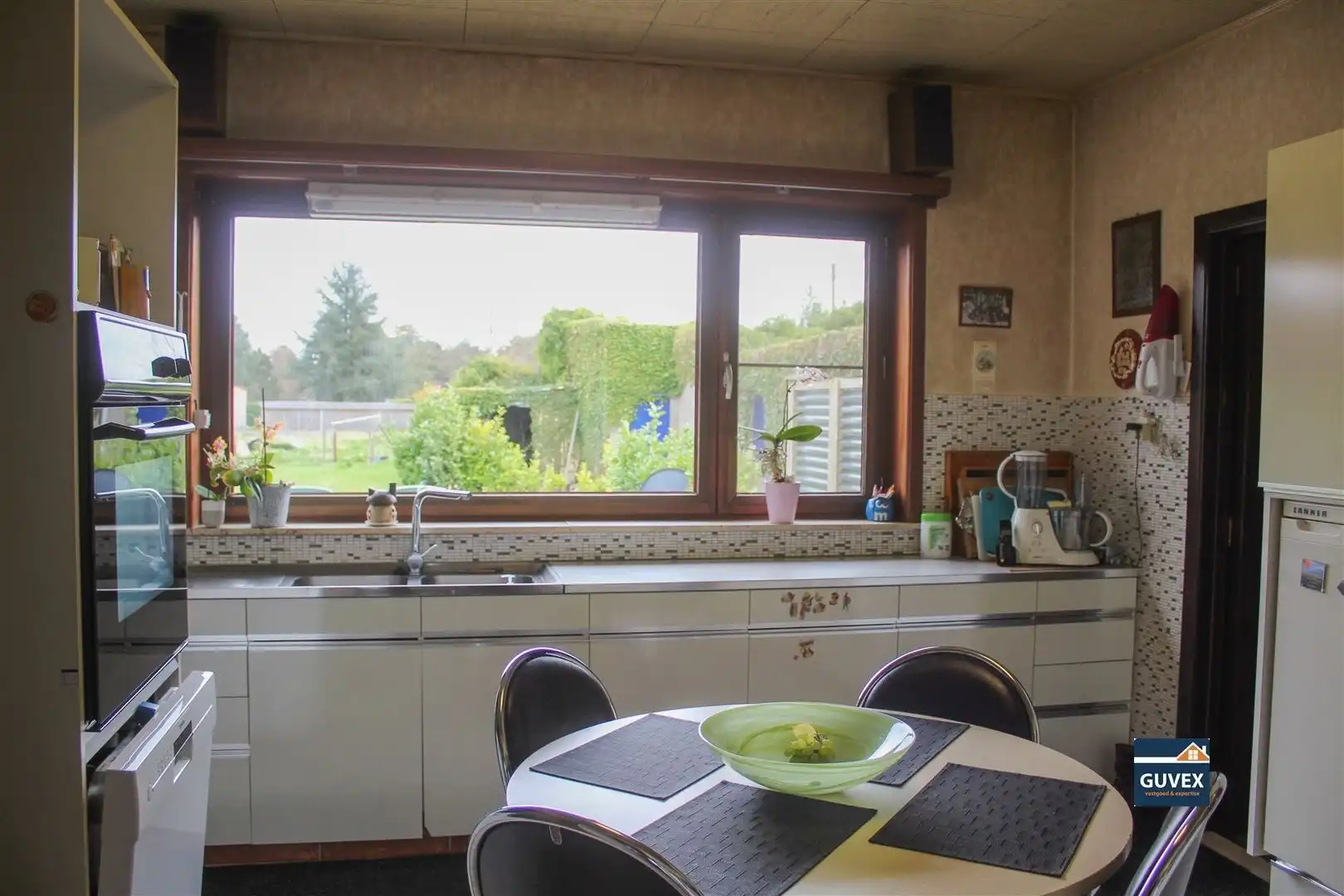 Gelijkvloers woning gelegen op 23 are 90 ca.  foto 4