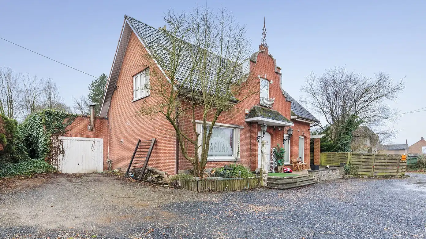 Goed gelegen pand / opbrengsteigendom met tuin te koop te Lubbeek foto 2