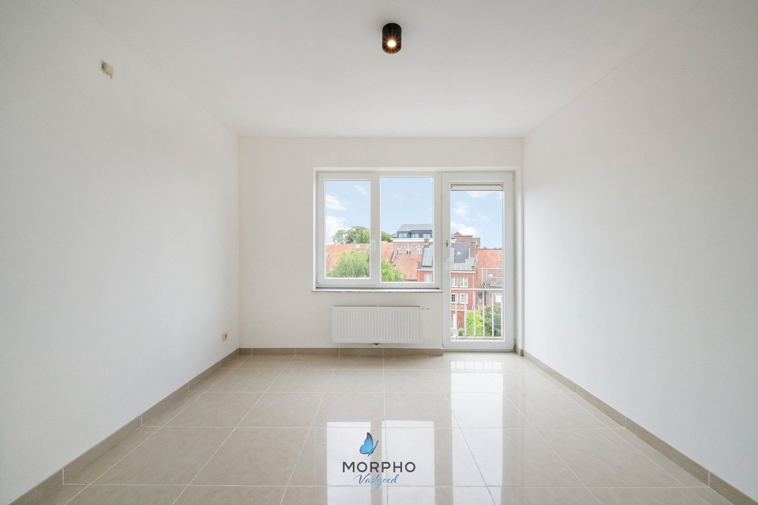 Modern en energiezuinig 2-slaapkamerappartement op de derde verdieping in hartje Temse! foto 8