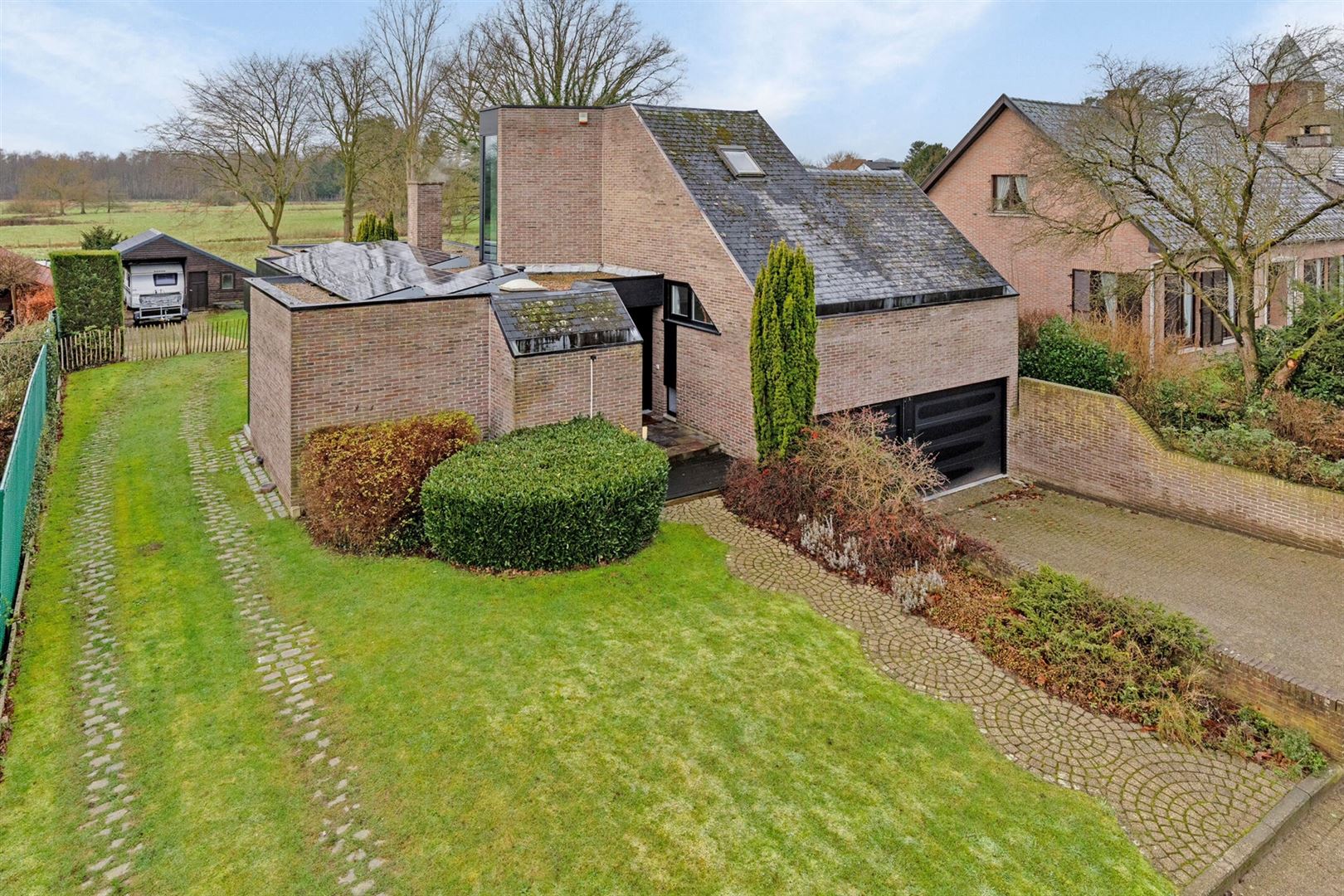 TE KOOP: Vrijstaande woning op meer dan 10are in Meldert! foto {{pictureIndex}}