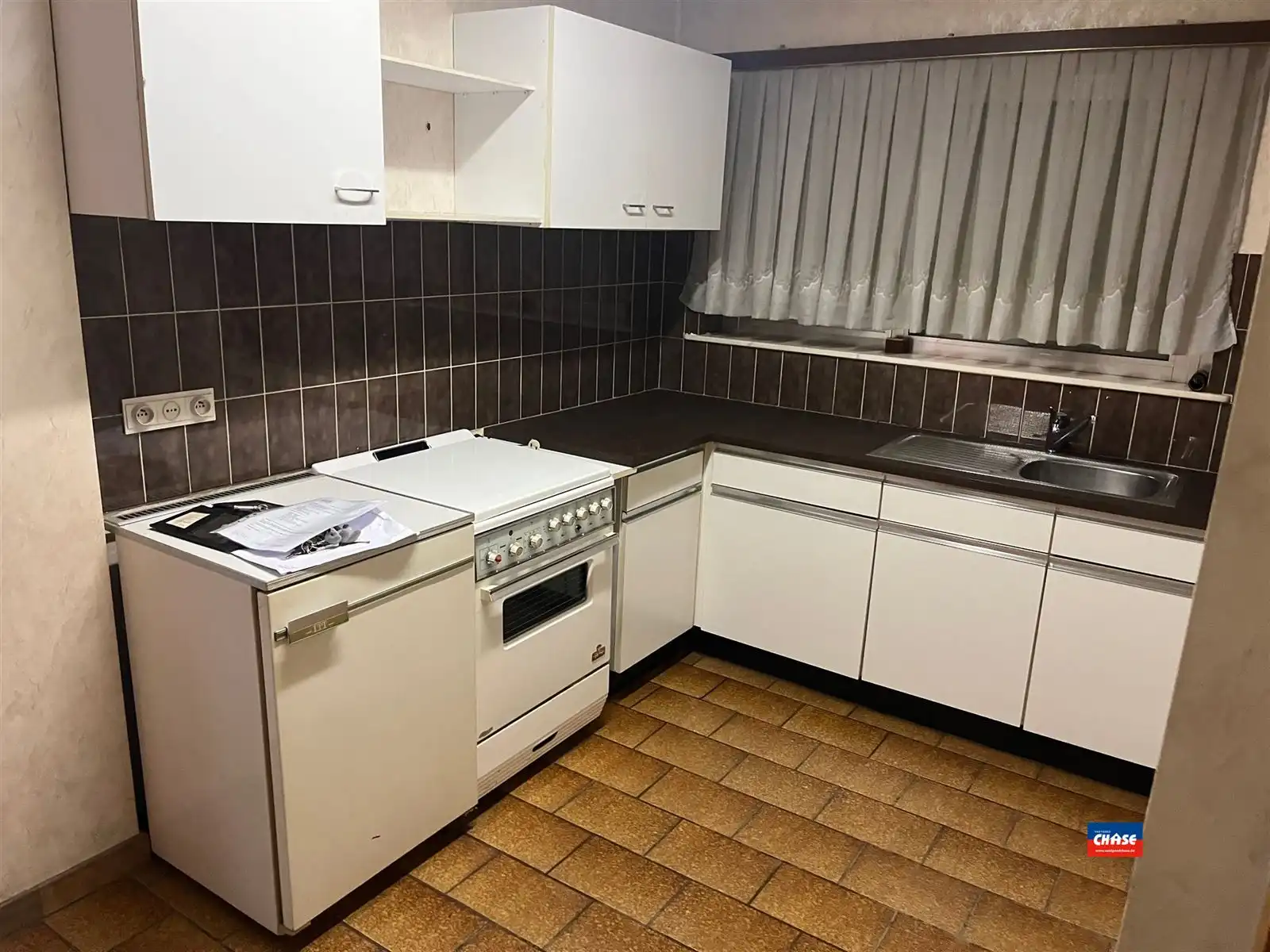 Te renoveren handelshuis op hoekligging foto 3