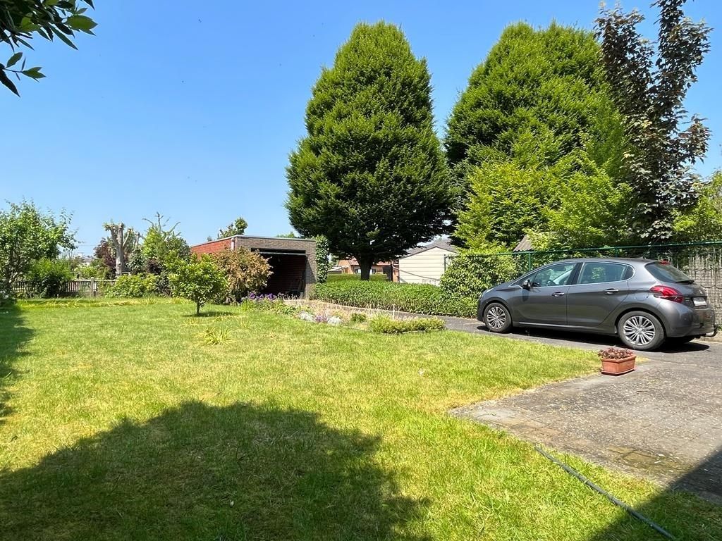 Hedendaagse woning met 4 slaapkamers, gelijkvloerse bureau en zonnige tuin met garage te Kuurne. foto 5