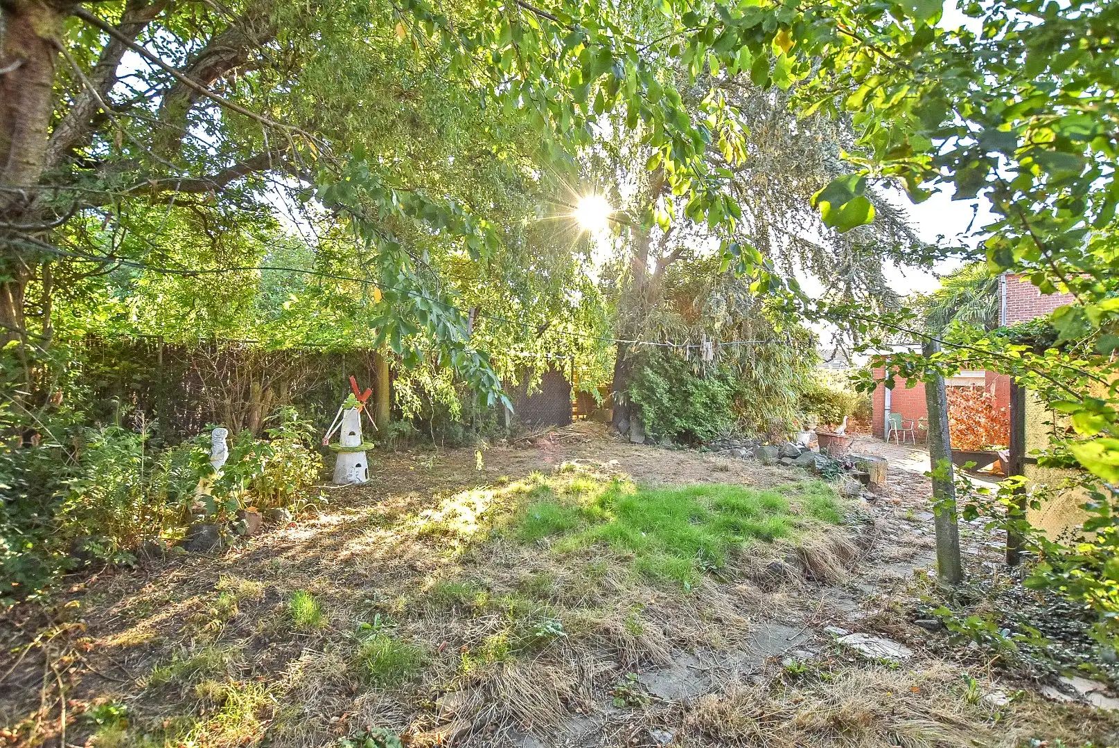 Te renoveren woning op een perceel van 392m² te Houthulst! foto 5
