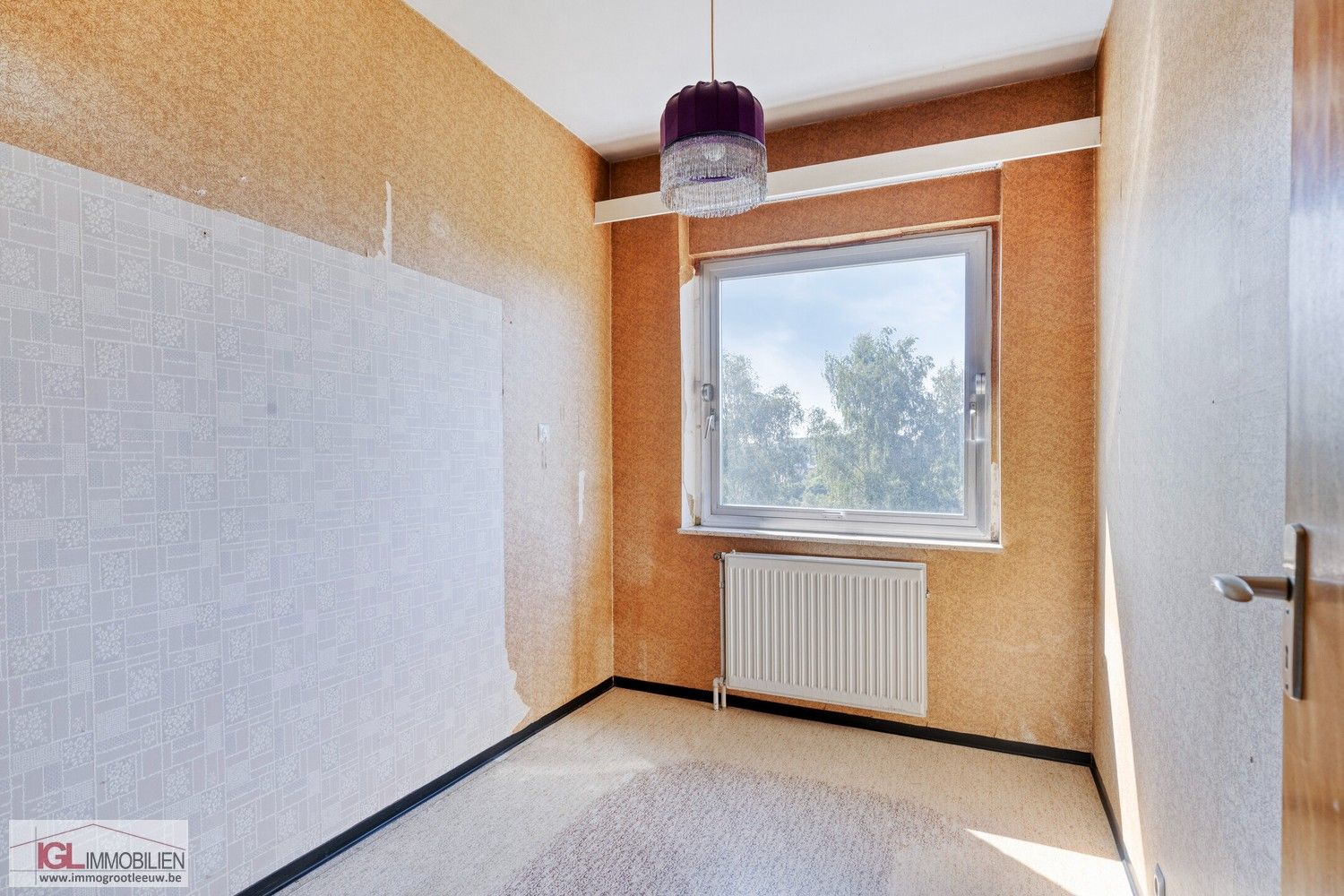 Te renoveren appartement met 3 slaapkamers en garage nabij het centrum van Sint-Pieters-Leeuw foto 9
