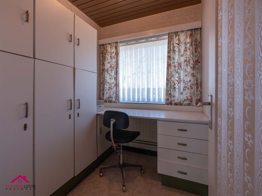 Half vrijstaande woning met garage foto 39