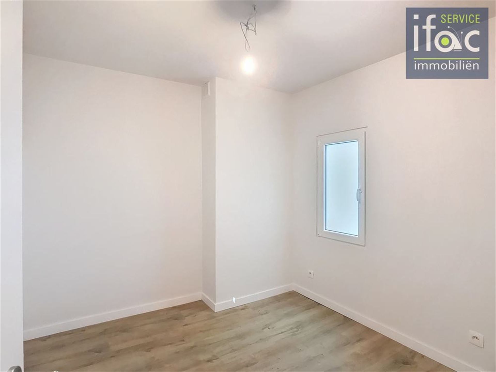 Aangename en volledig gerenoveerde duplex foto 6