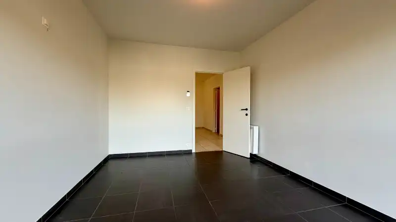 Lichtrijk hoekappartement met 2 slaapkamers en ondergrondse parkeerplaats foto 7
