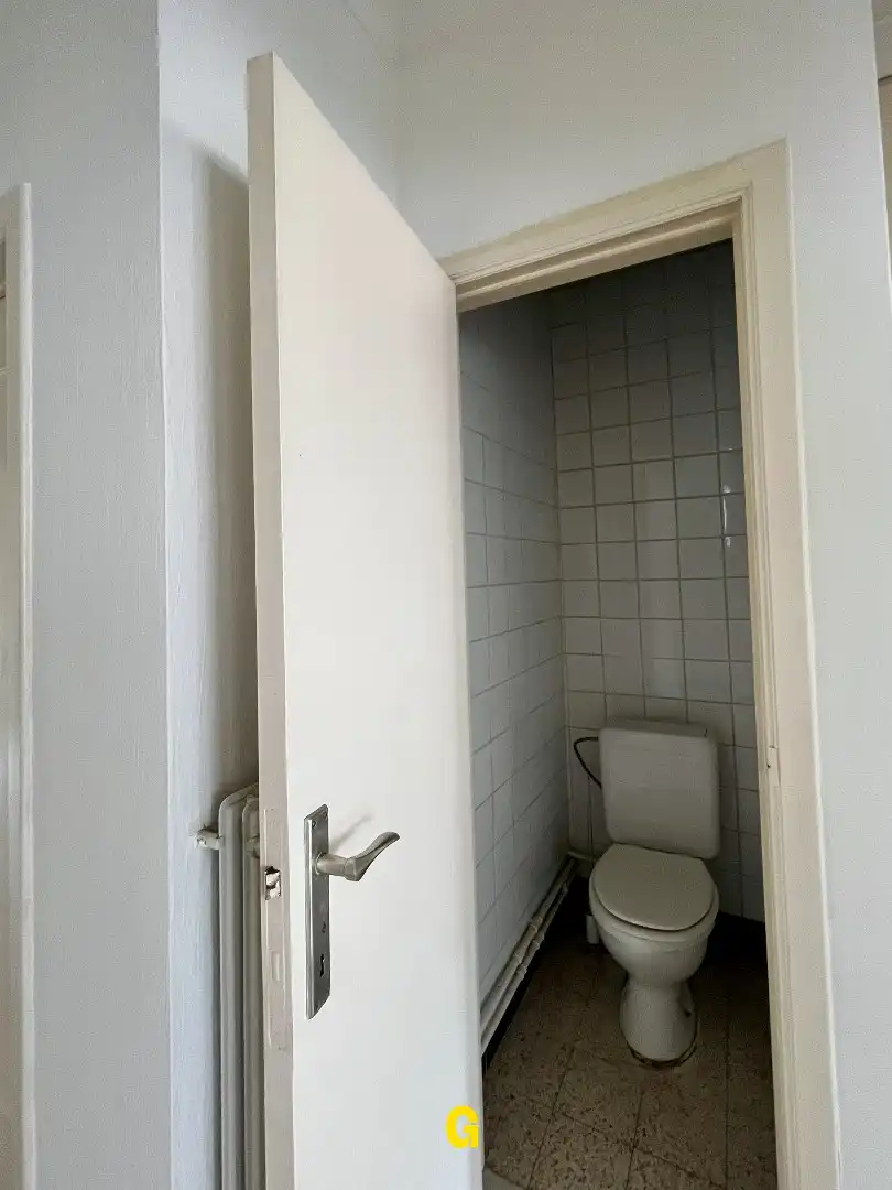 Betaalbaar appartement met twee slaapkamers, kelder en standplaats in hartje Bilzen foto 14