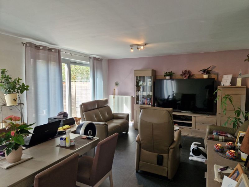 Prachtig gelijkvloersappartement met 2 slaapkamers,  tuin en garage foto 2