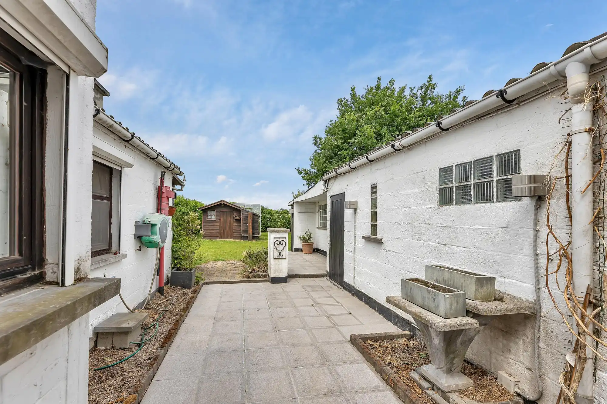 Goed onderhouden woning met garage en tuin foto 26