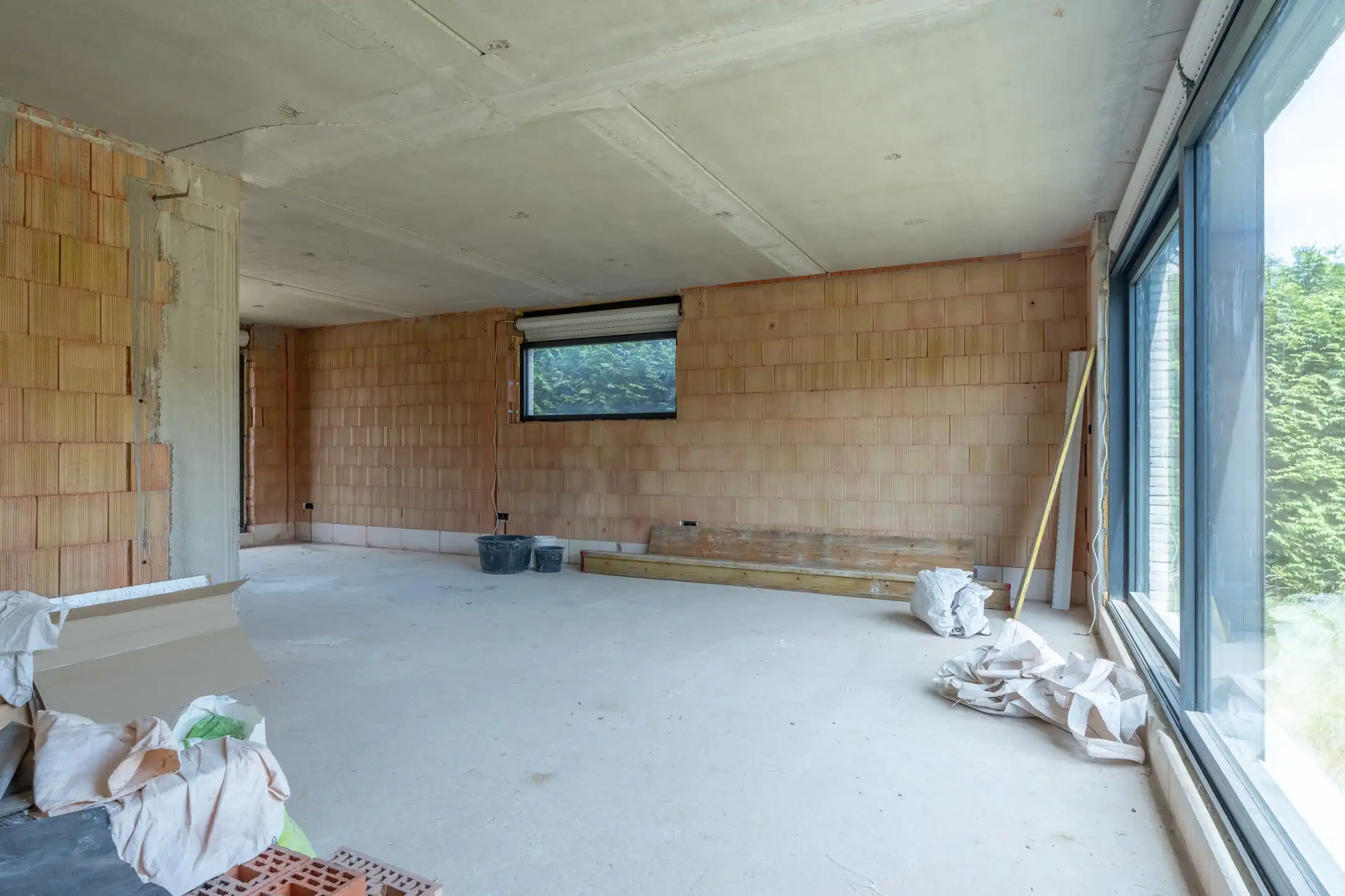 Verder af te werken woning met o.a. 4 slaapkamers, inpandige garage, ... foto 6