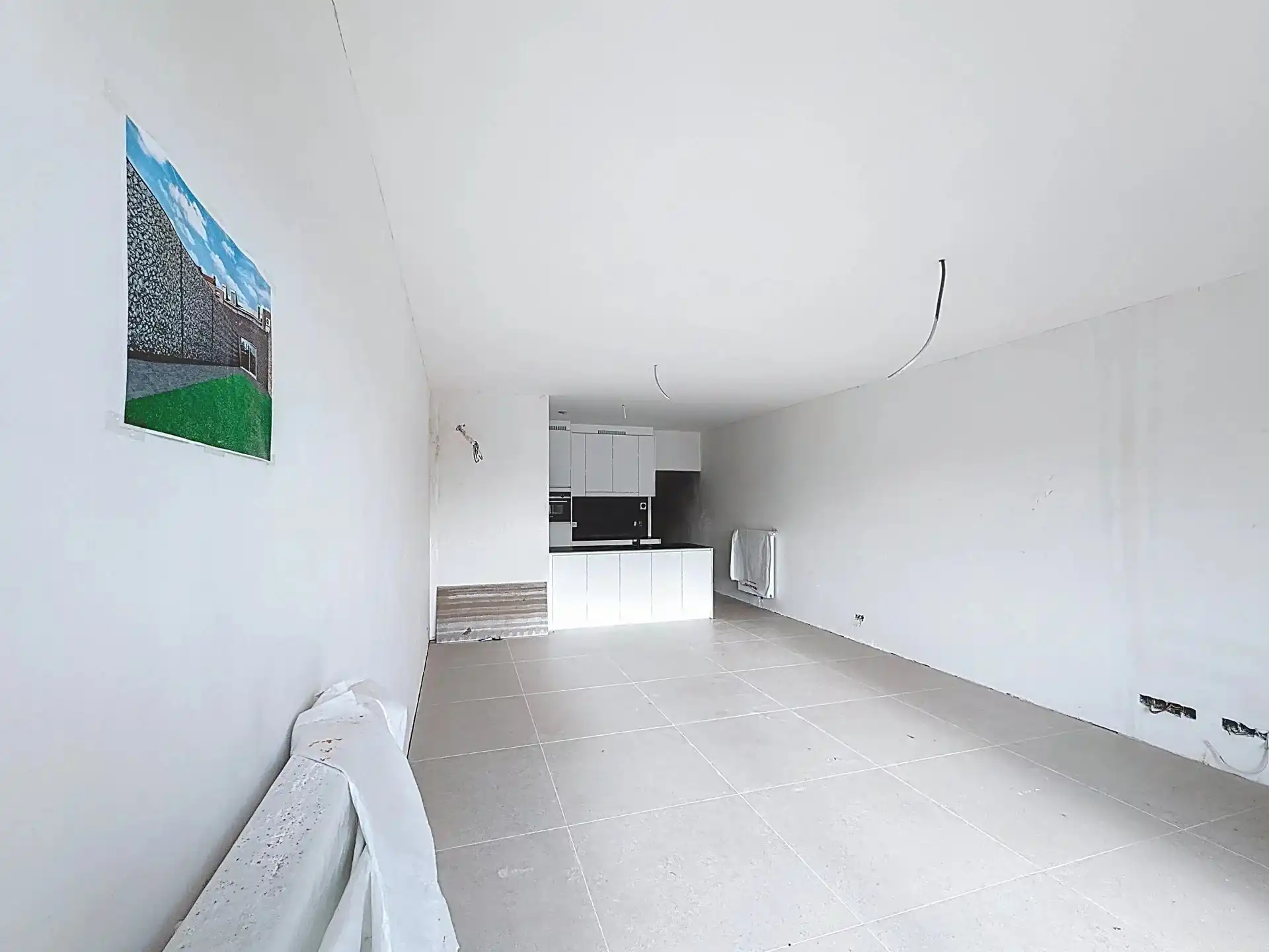 Luxueus en modern afgewerkt gelijkvloers appartement met tuin, 1 slaapkamer en 2 staanplaatsen. foto 3