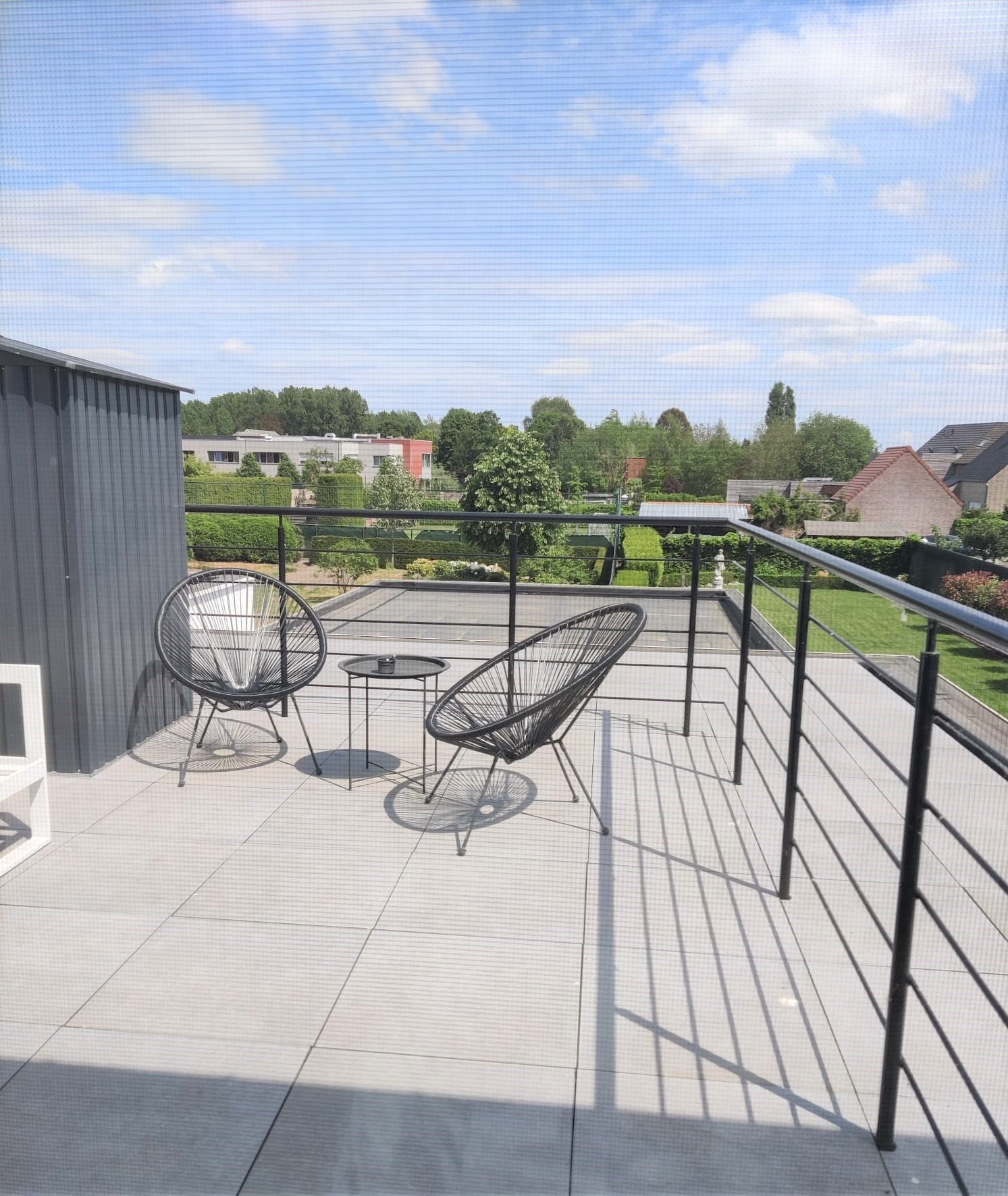 Gezellig duplex-appartement in centrum van Eigenbilzen met leuk terras foto 9