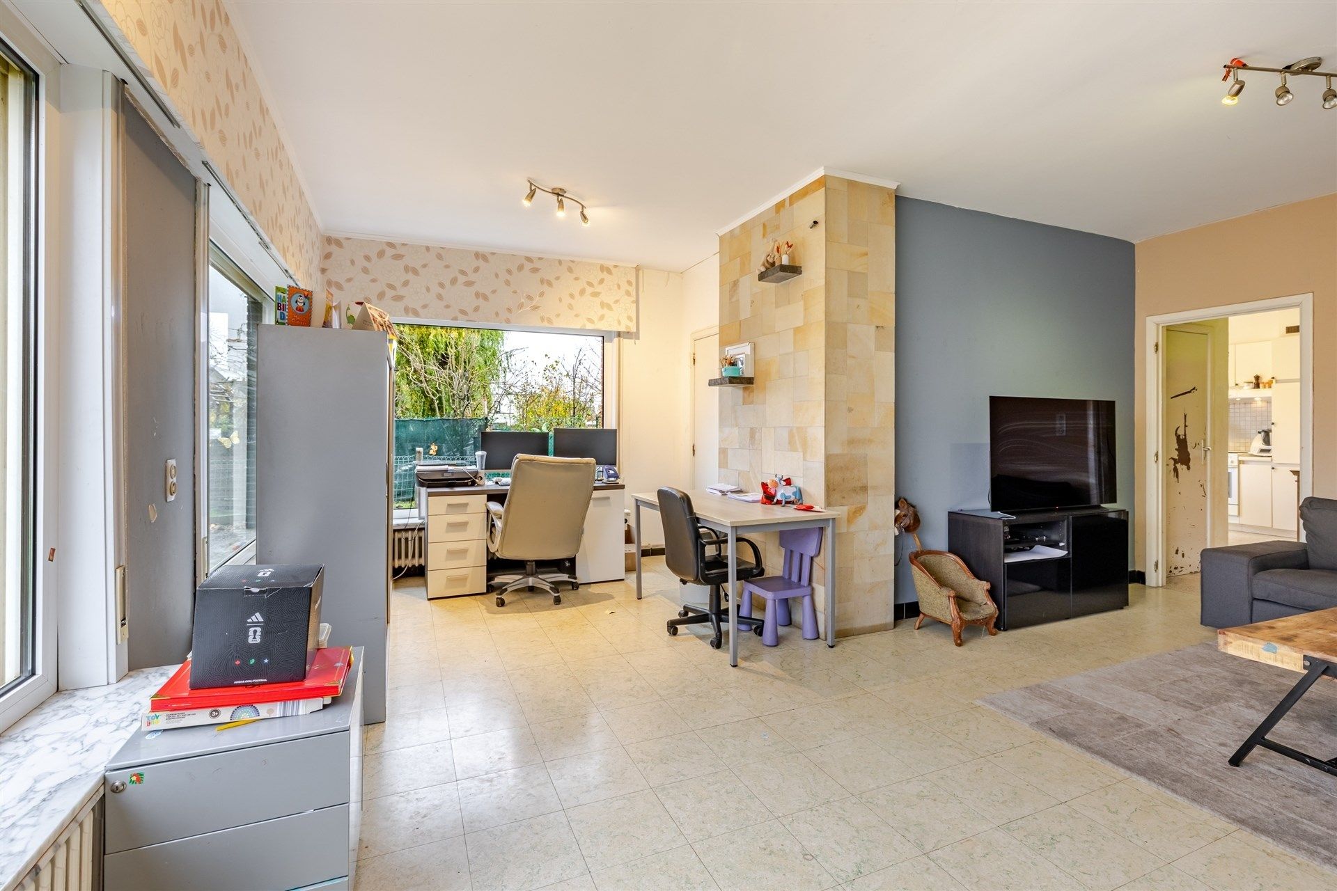 Op te frissen woning met supertoffe tuin, nabij het centrum! foto 6