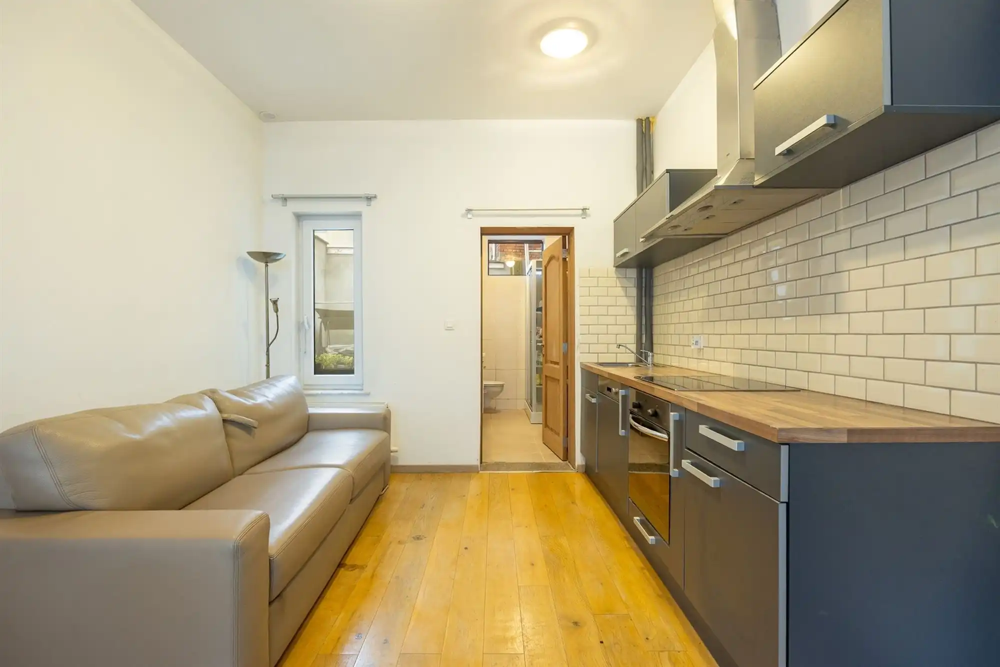 Instapklare woning met 2 à 3 slaapkamers en stadskoer foto 4