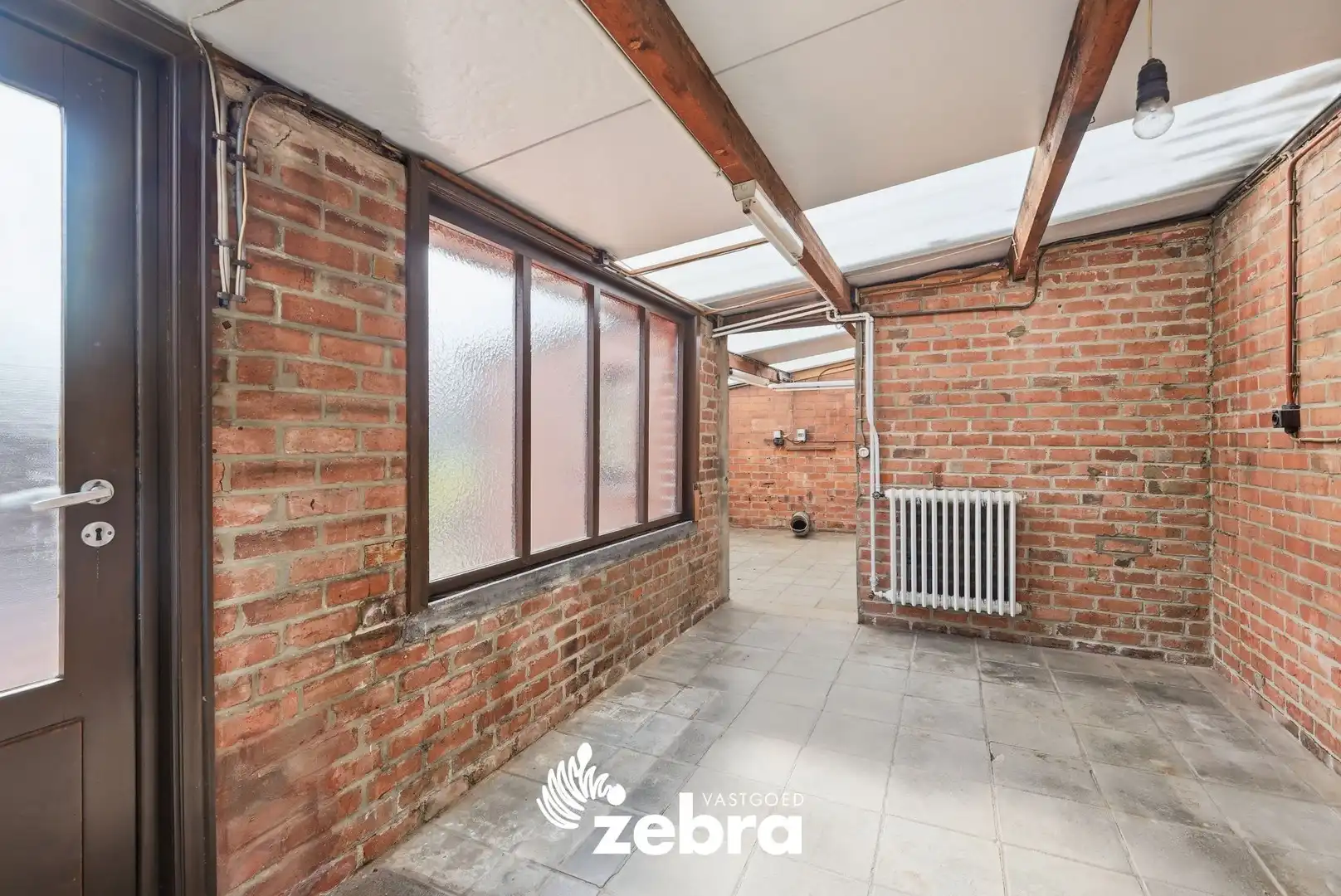 Woning met veel potentieel, 3 slaapkamers en ruime zolder in hartje Tielt! foto 19