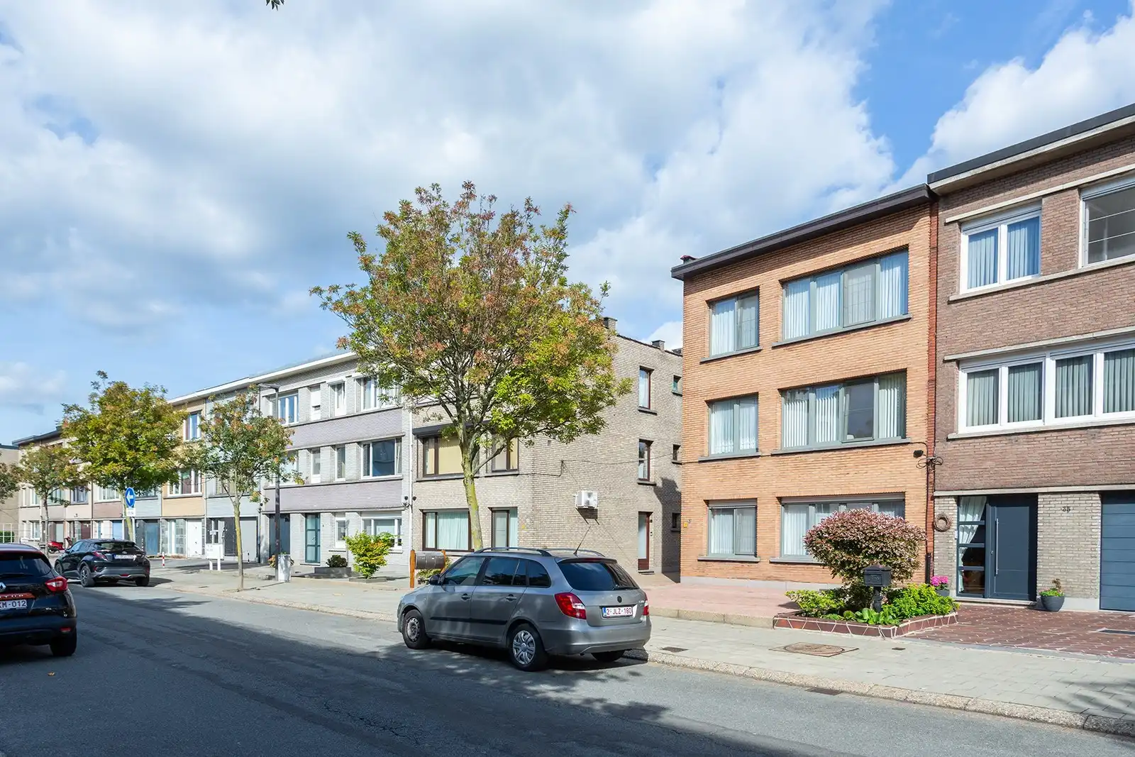 Opbrengsteigendom 3 ruime 2-slaapkamerapp. + 3 garages foto 28