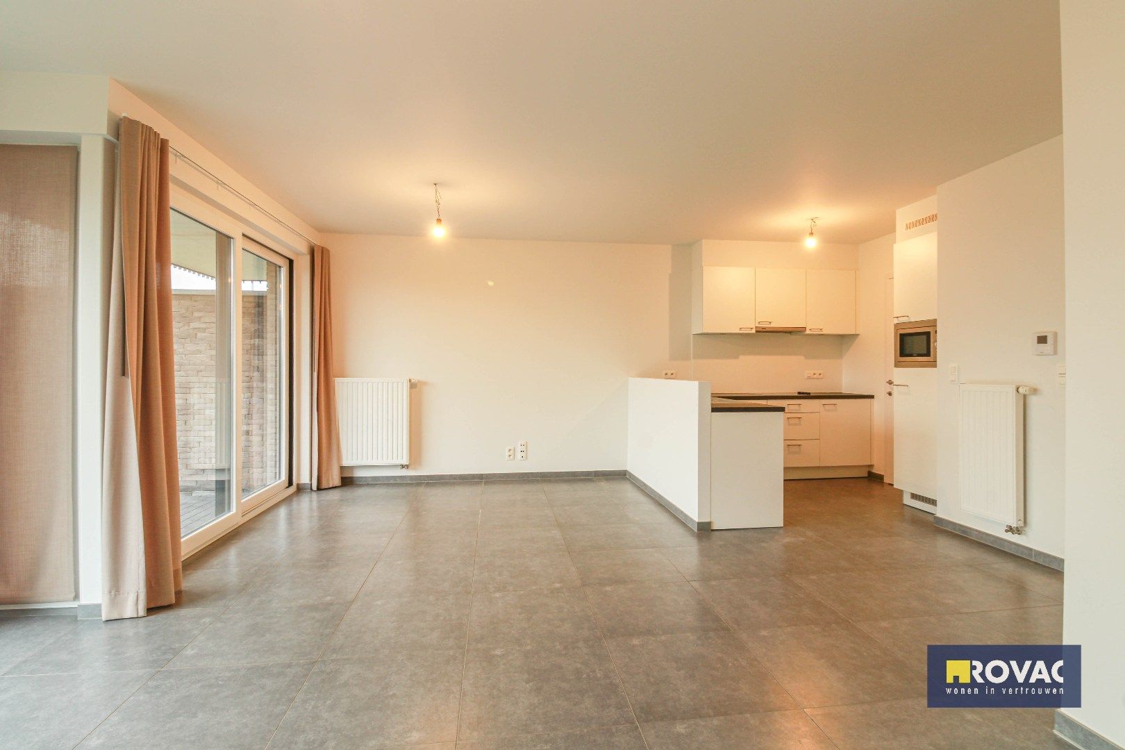 Gelijkvloers appartement met tuin en garage! foto 10