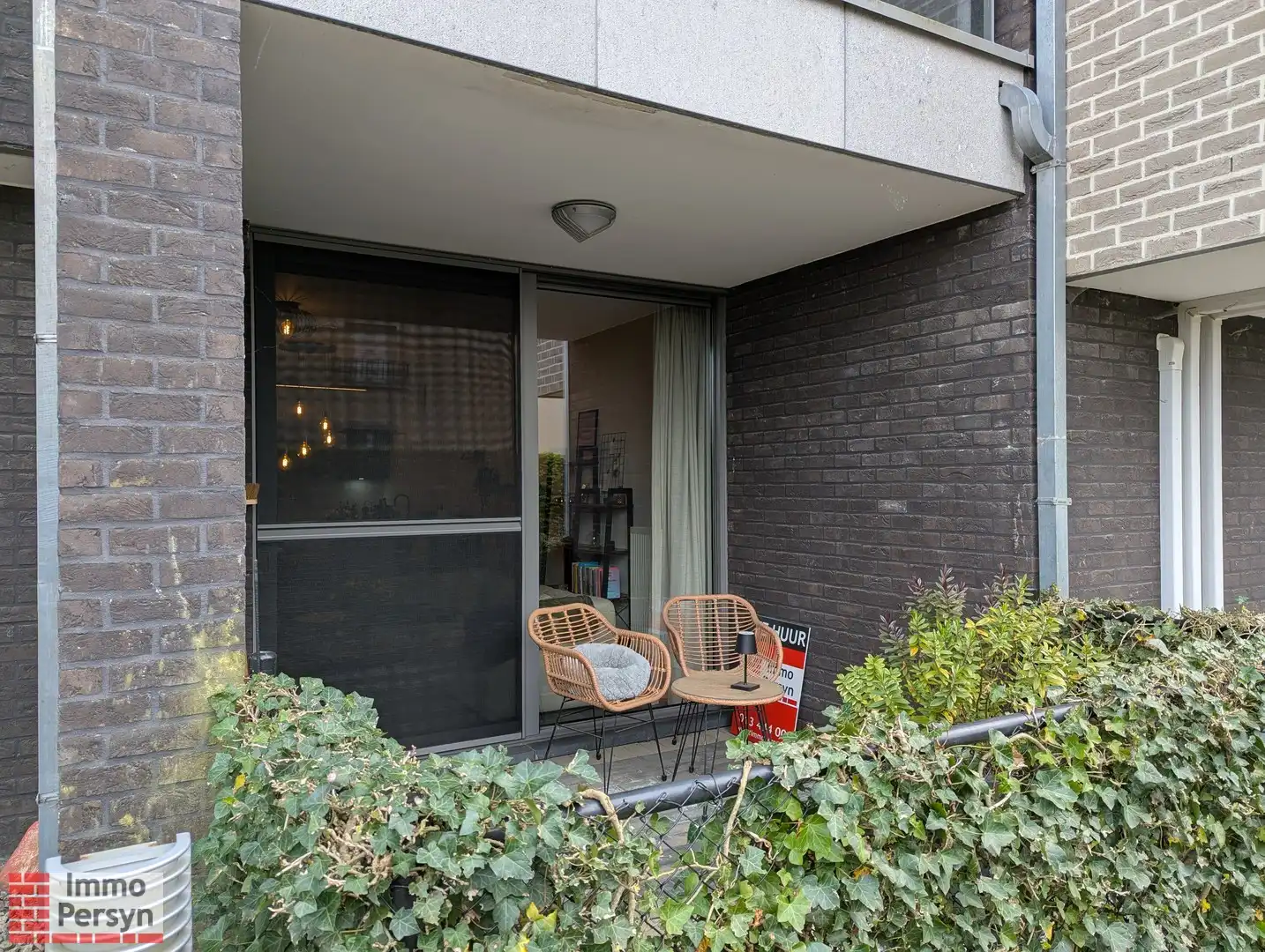 Gelijksvloer appartement met tuintje foto 22