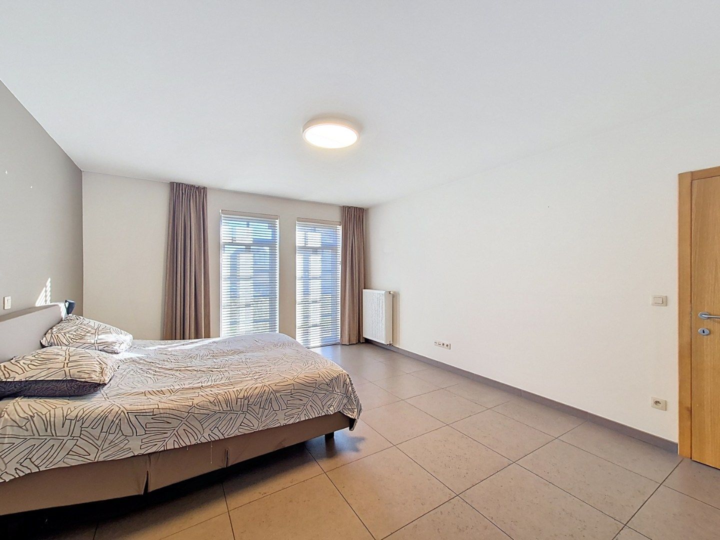 Gelijkvloersappartement met 2 slaapkamers en 2 autostandplaatsen foto 12
