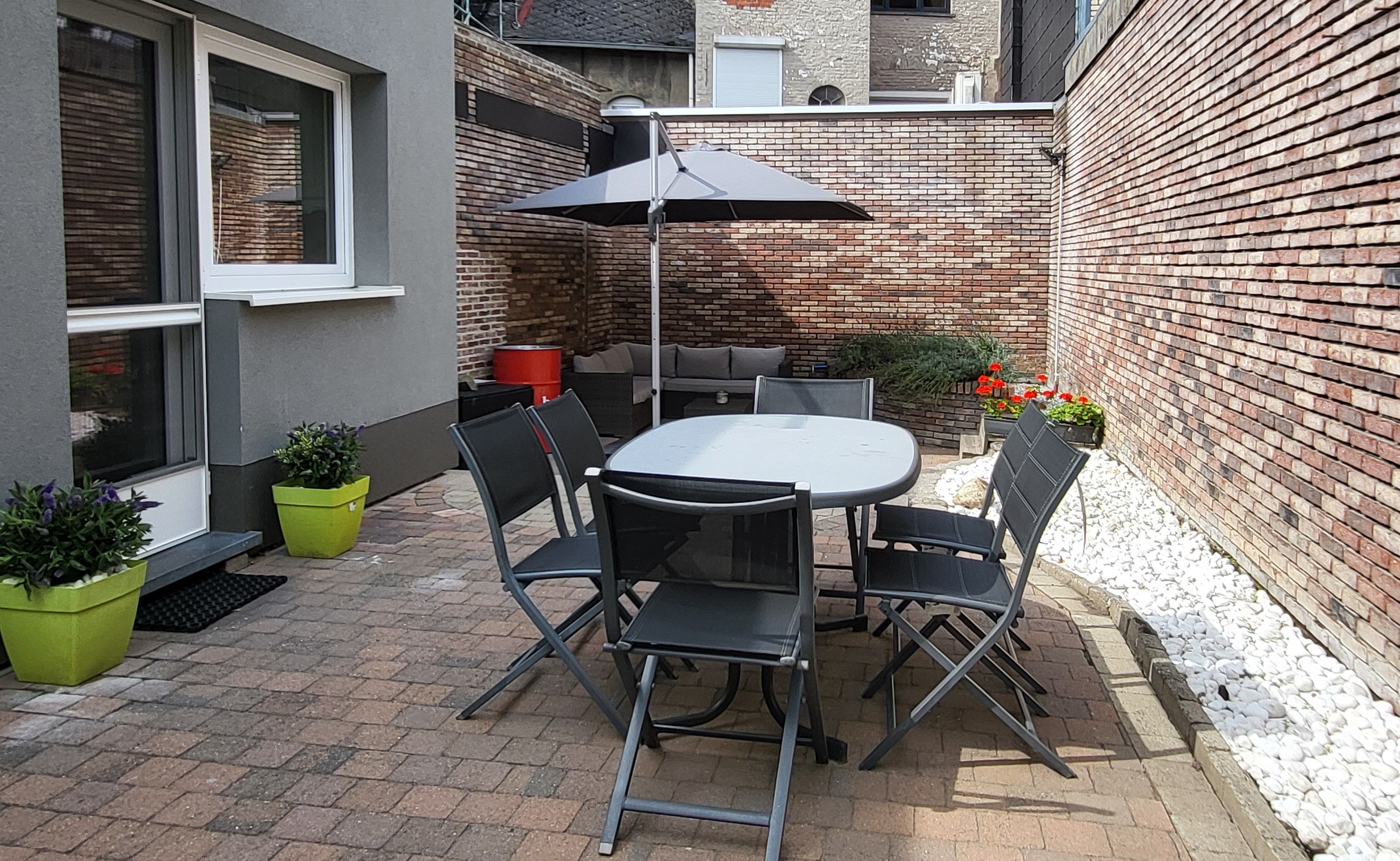 Knap gerenoveerde stadswoning op 194m² met tuin en garage. Topper! foto 7