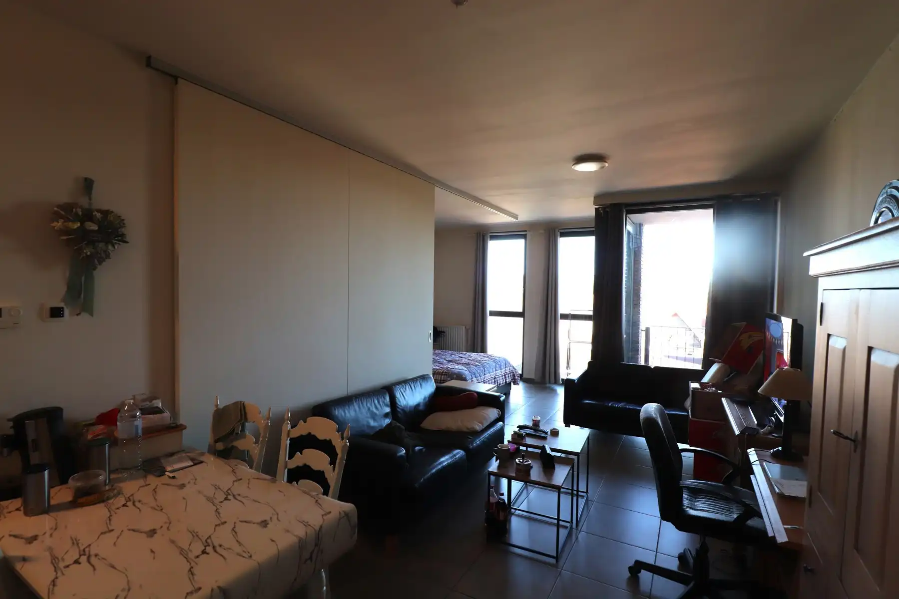 Studio op de dakverdieping met lift,  terras en kelderberging. foto 2