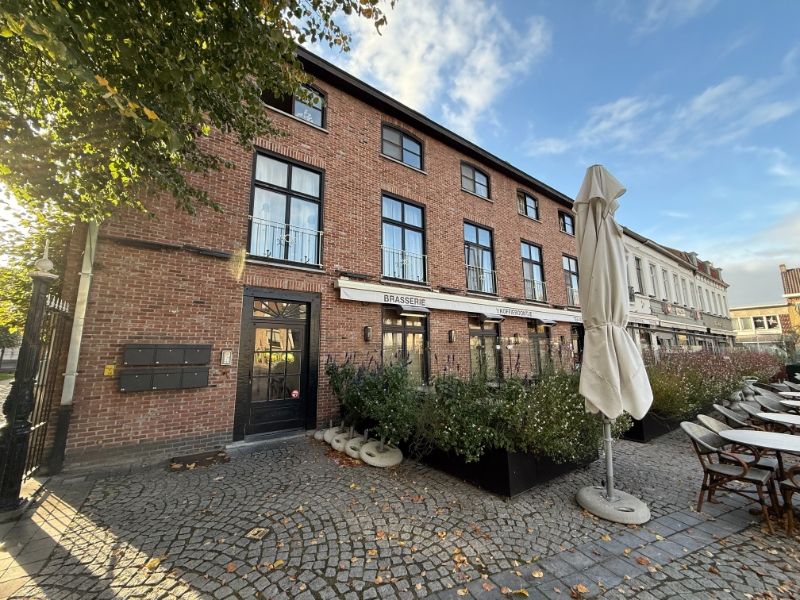 Karaktervolle opbrengsteigendom met 5 appartementen op toplocatie – Markt foto 2