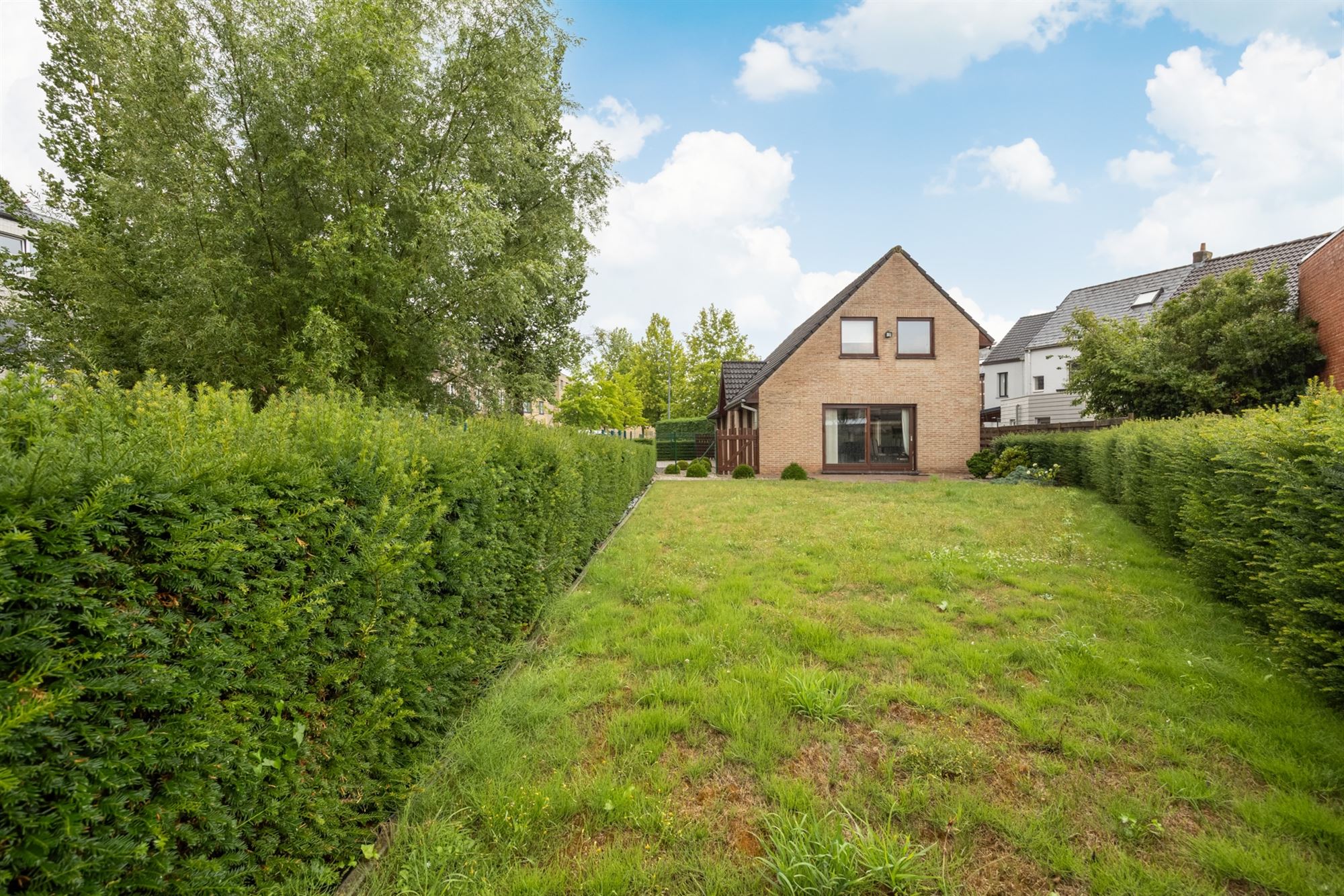 Vrijstaande woning met 4 slaapkamers en tuin foto 16