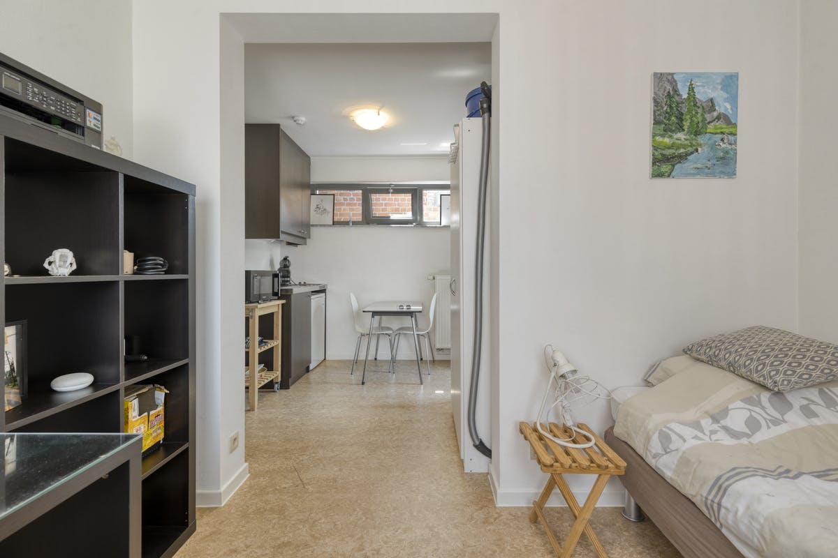 Uniek pand met appartement en 3 studentenkamers in Sint-Michiels foto 12