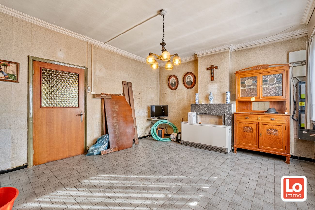 Landelijk gelegen halfopen woning met verschillende stallingen op groot perceel grond met open zicht in Zeveneken! foto 5