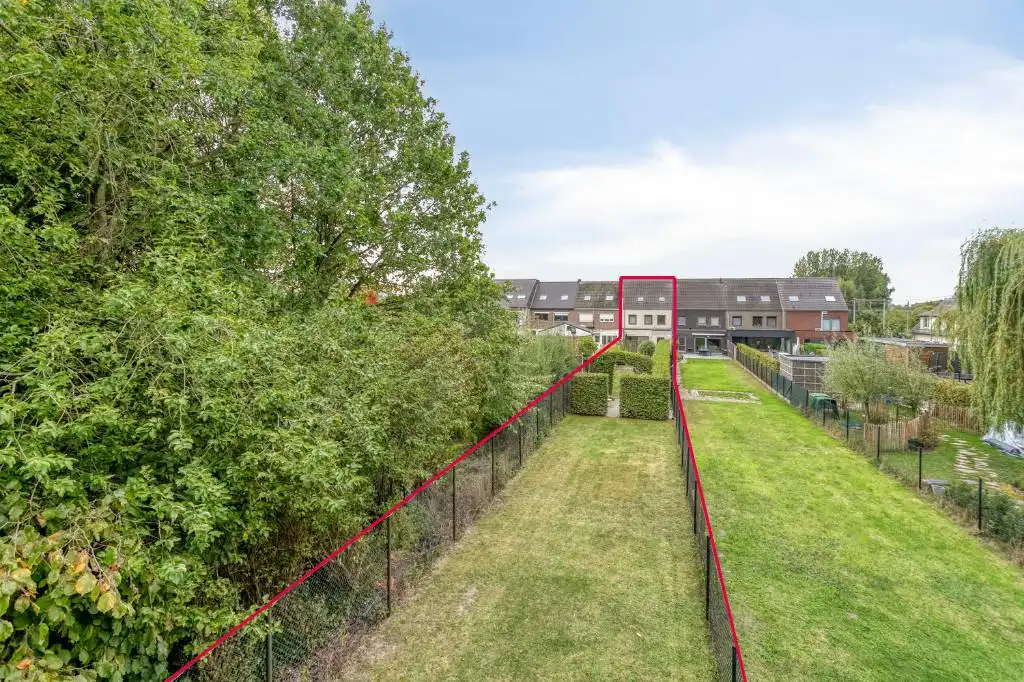 Ruim instapklaar huis: 4 slaapkamers, garage en grote tuin foto 15