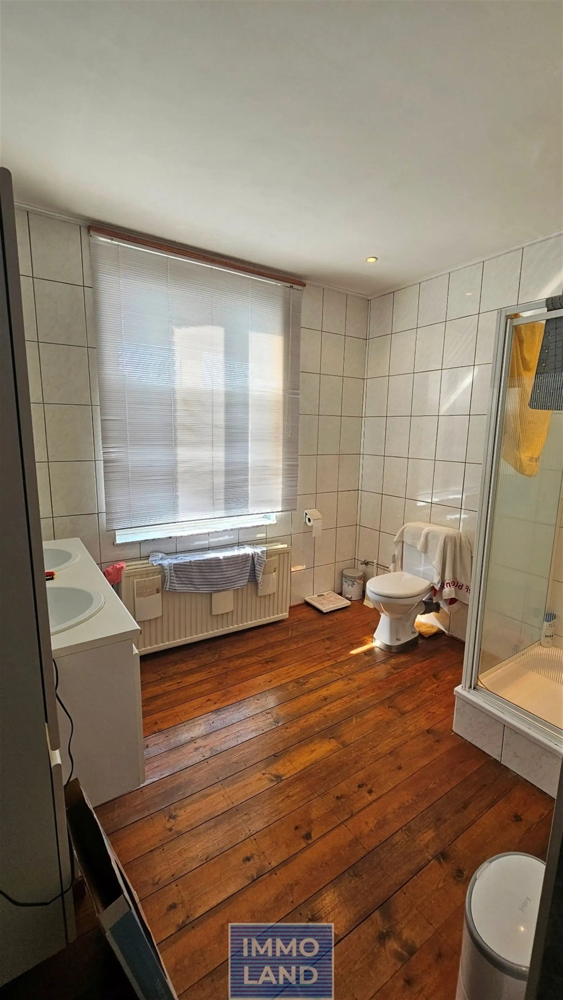 Charmante rijwoning met diepe zuid gerichte tuin in Hasselt. foto 22