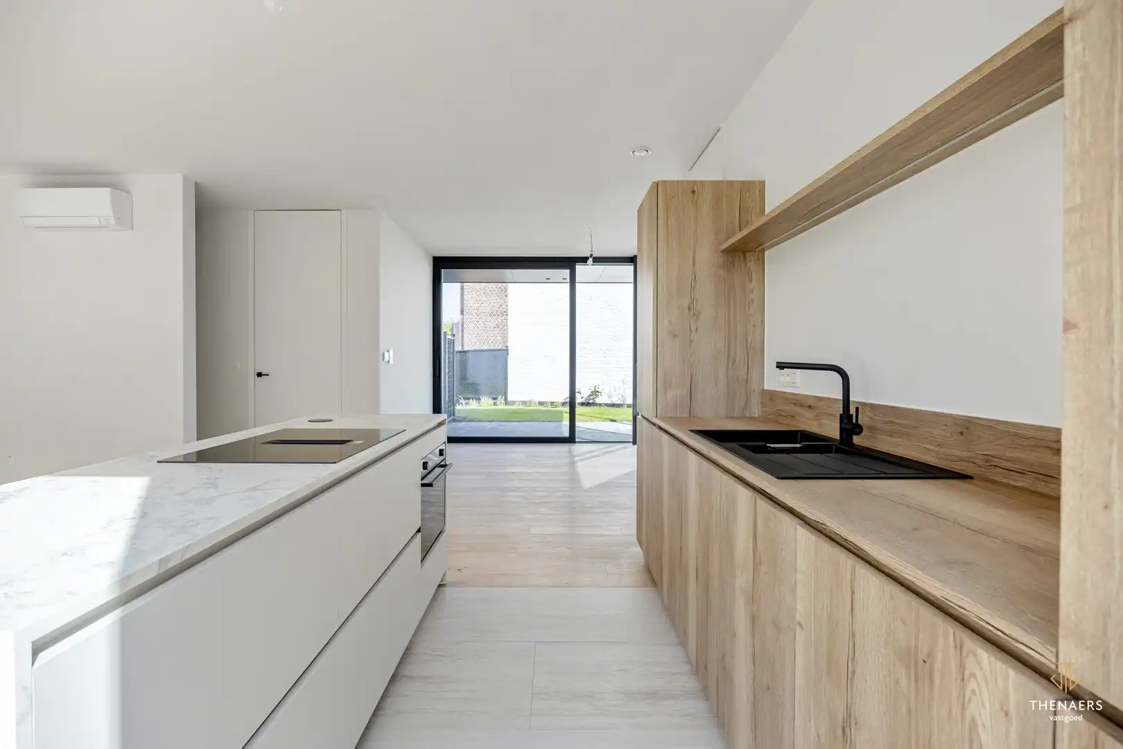 Strakke en luxueus gerenoveerde open bebouwing met hoogwaardige afwerking en EPC A in Sint-Truiden (Wilderen).  Aankoop aan 6% btw mogelijk onder voorwaarden. foto 11
