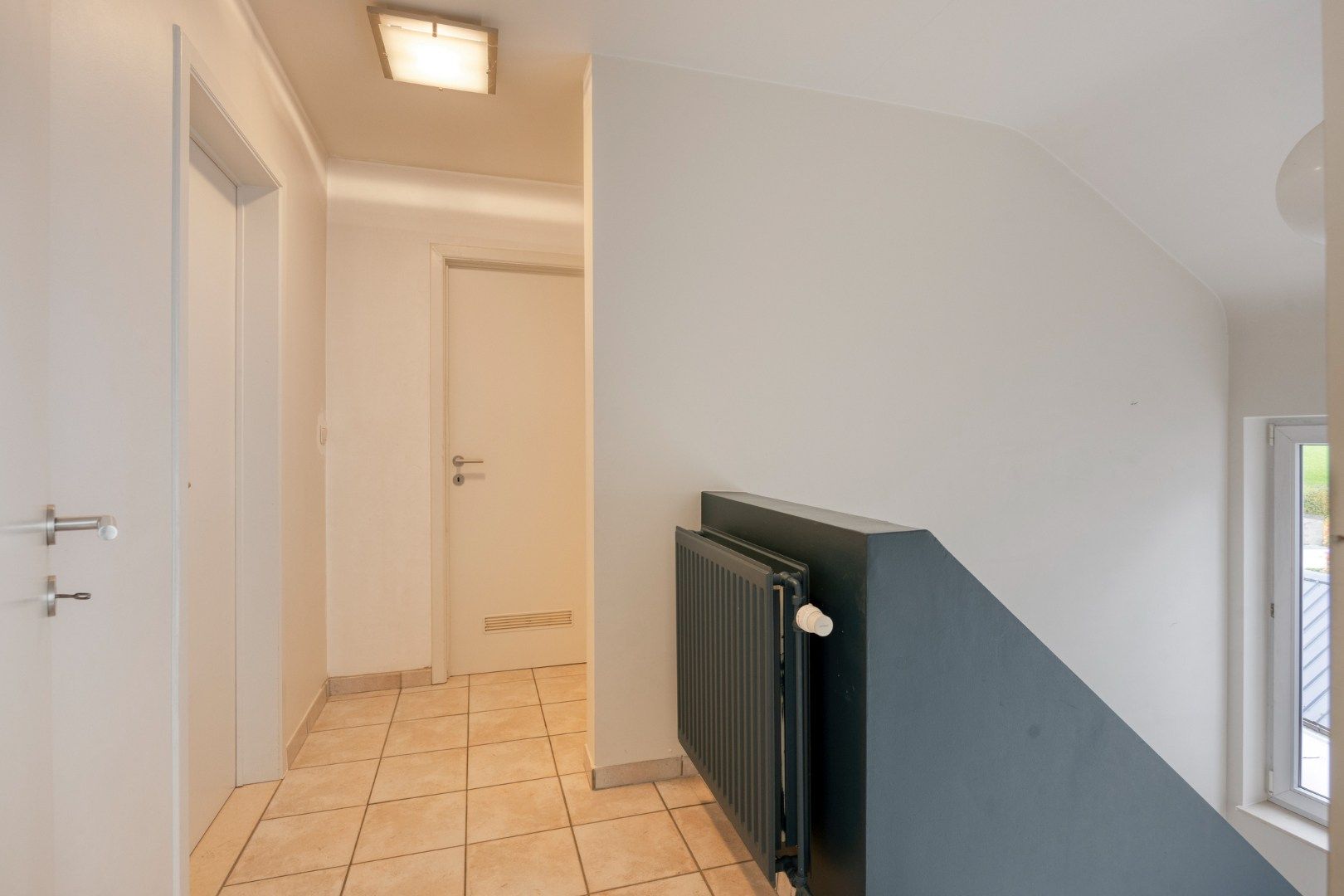 Appartement met 3 slaapkamers, autostaanplaats en terras in het centrum van Lubbeek – EPC 220 kWh/m² - bewoonbare opp. 182 m² foto 11