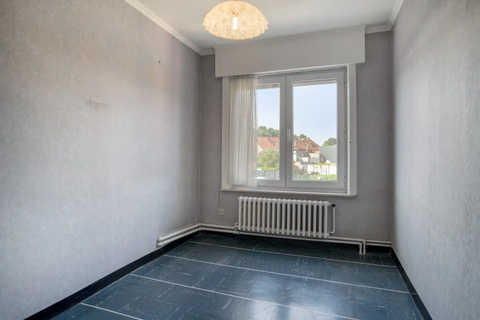 Gezellige rijwoning met 3 slaapkamers en garage! foto 10
