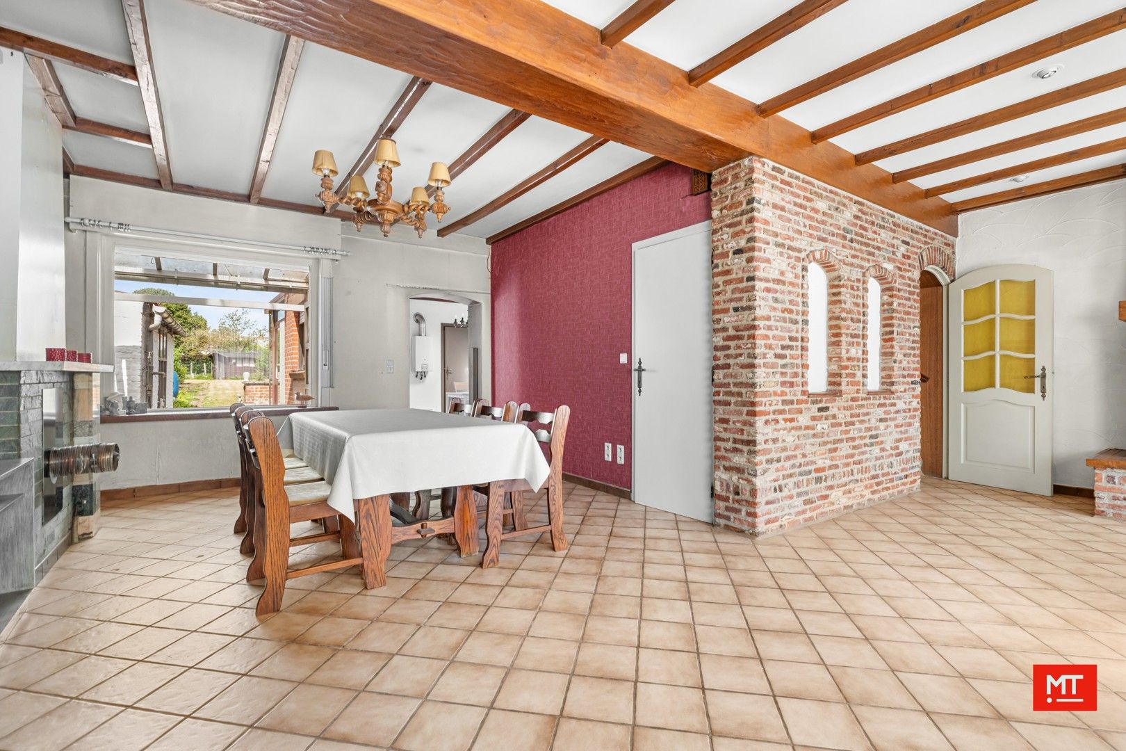 Te renoveren halfopen woning met 3 slaapkamers, Westgerichte tuin en garage op een rustige locatie in Beselare foto 3