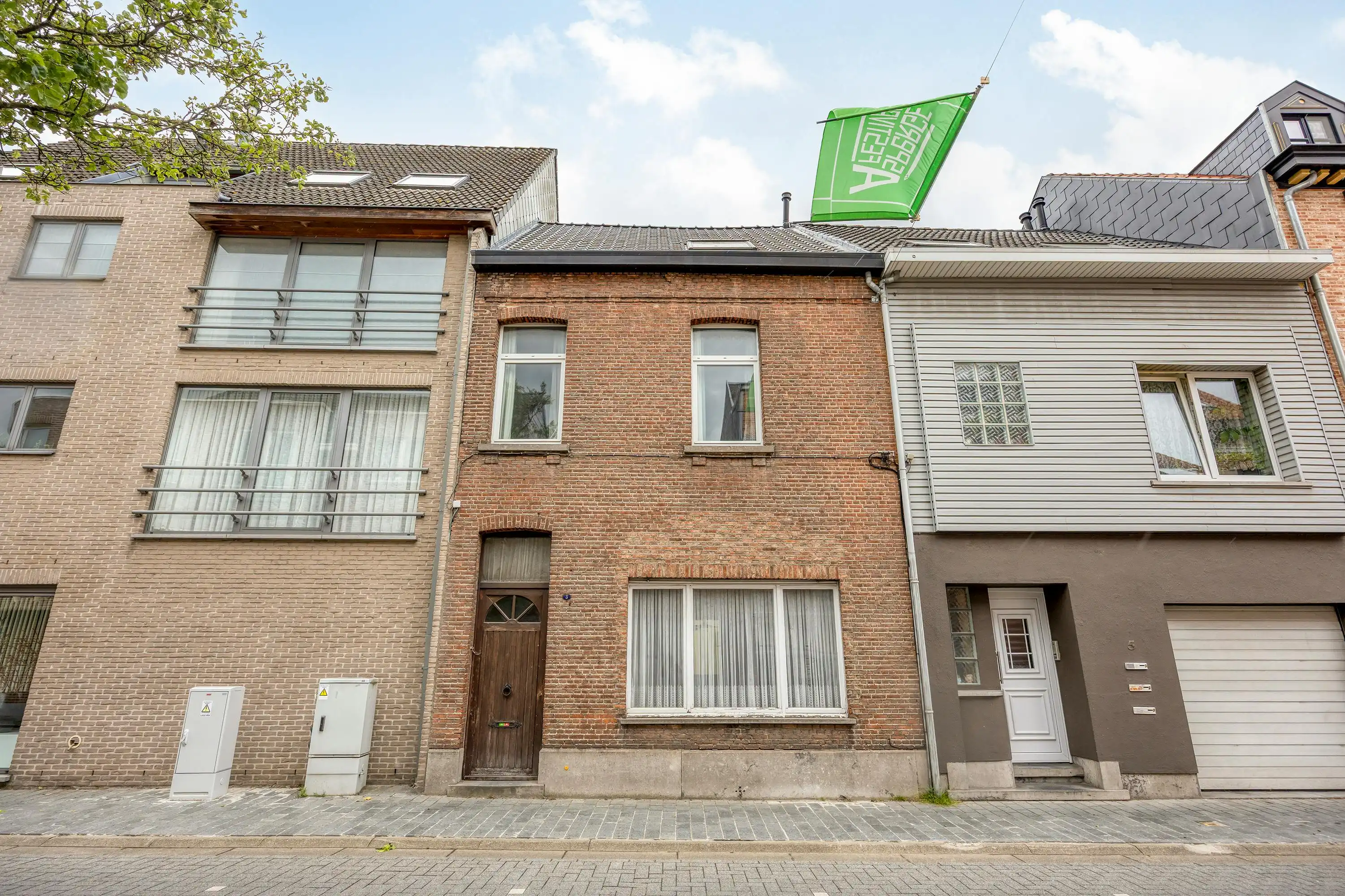 Te renoveren gezinswoning met tuin te koop in centrum Puurs foto 2