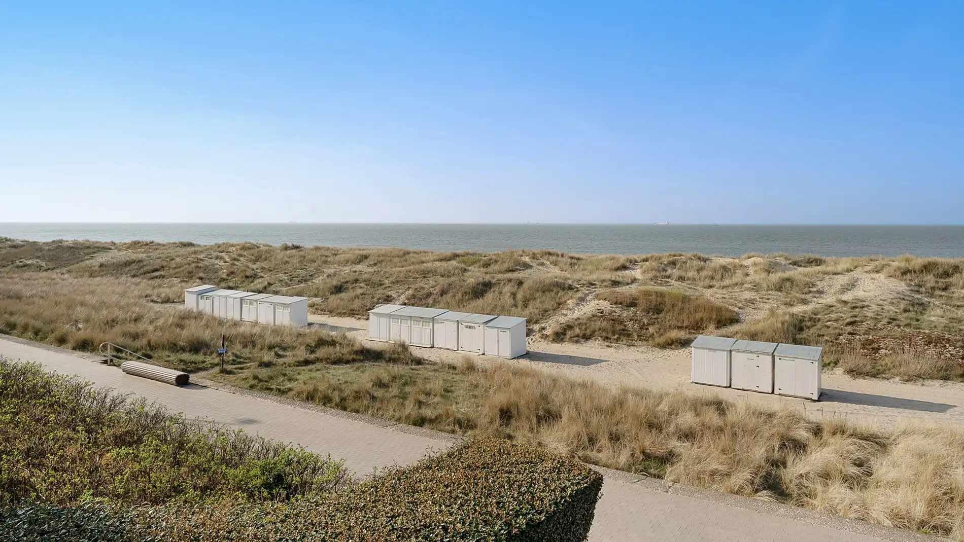 Uitzonderlijk hoekappartement met adembenemend zee-en duinenzicht langs de Wandeldijk in het Zoute foto {{pictureIndex}}