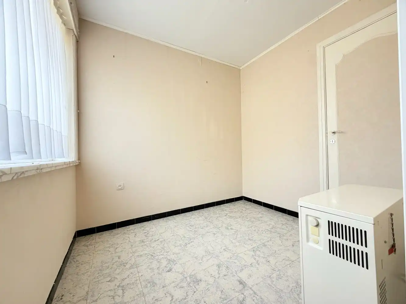 Te renoveren woning in het Centrum van Torhout foto 5