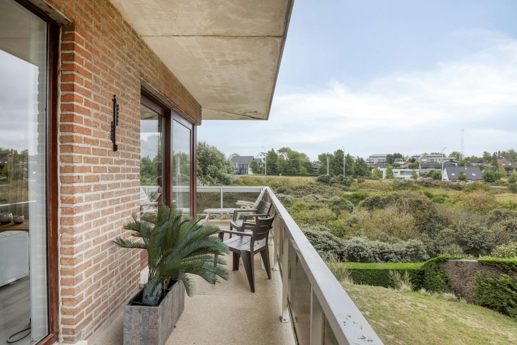 Zonnig hoekappartement met 2 slaapkamers en mooi groen zicht foto 2