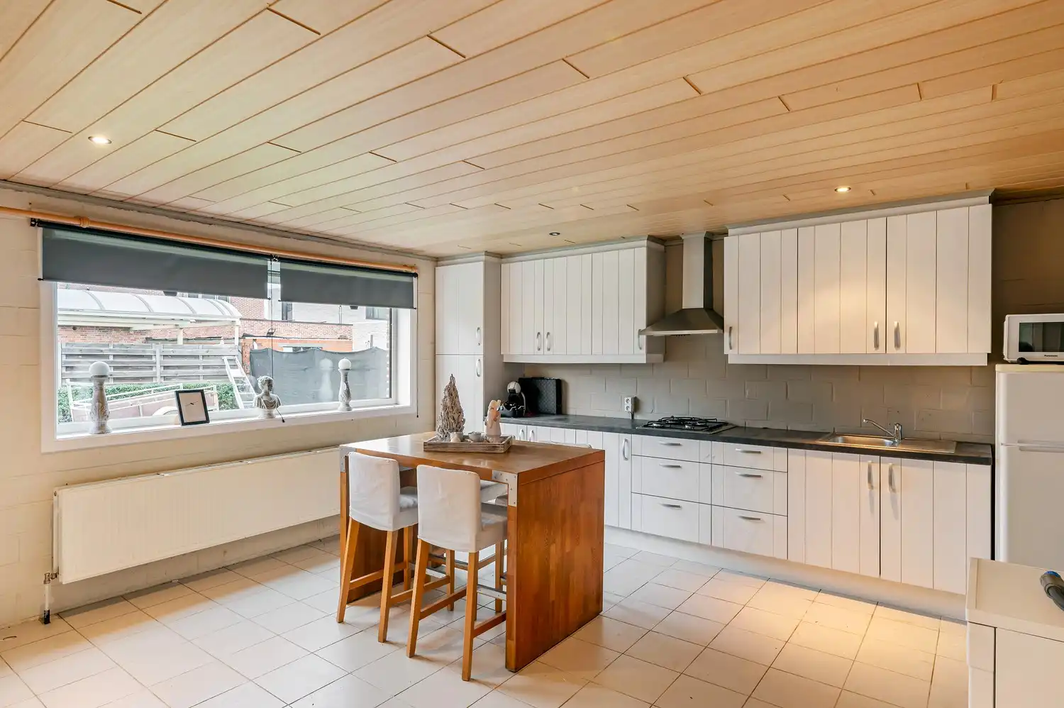 Ruime, instapklare pastorijwoning met bijgebouw op 1 180 m². foto 29