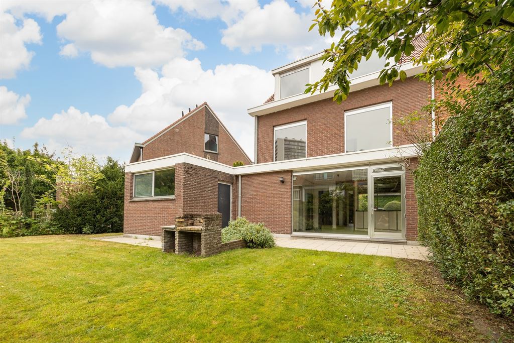 Unieke jaren 80-woning met ruime tuin foto 5