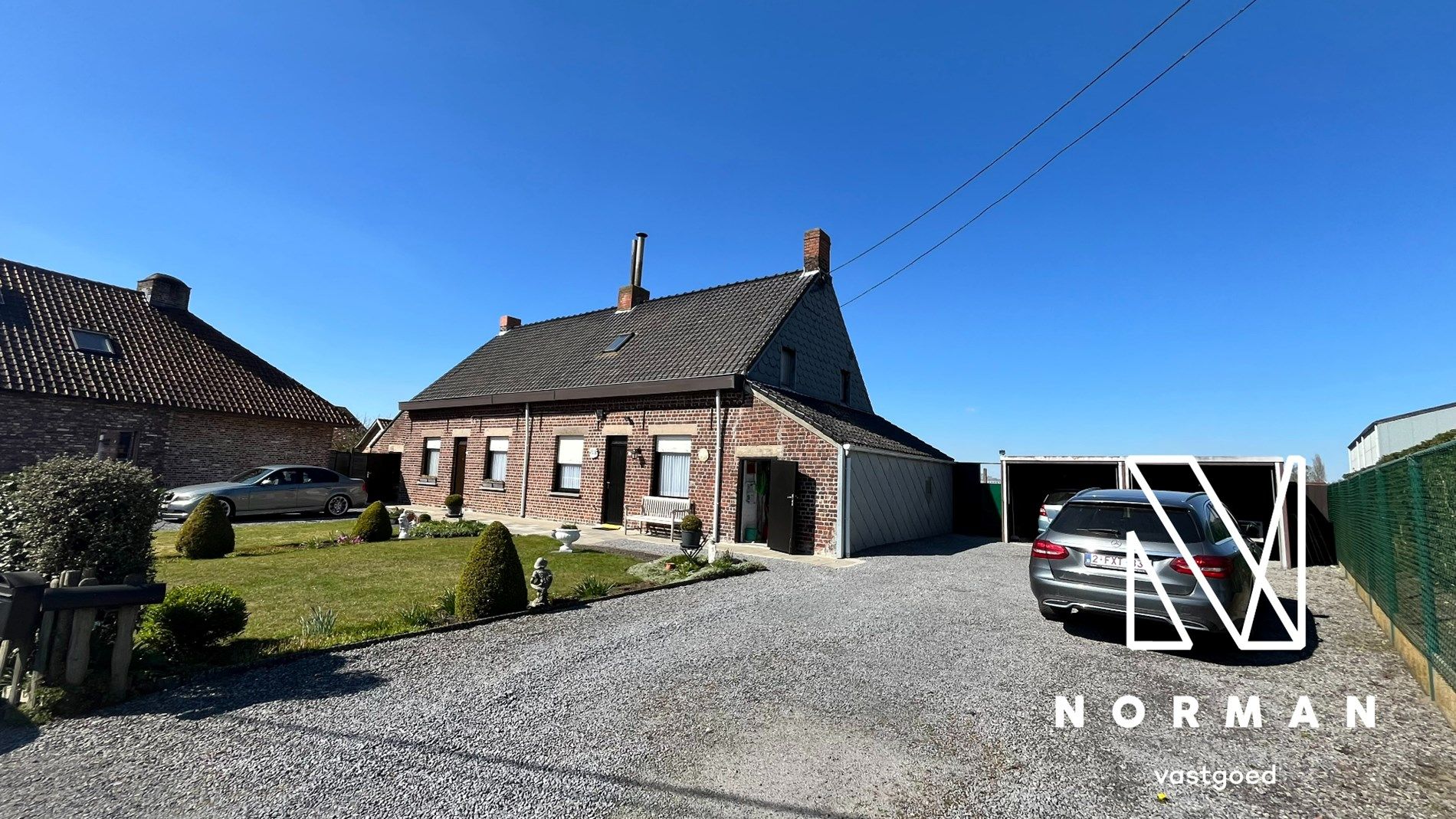 Hoofdfoto van de publicatie: Halfopen woning op prachtig perceel (697m²) te Ingelmunster.