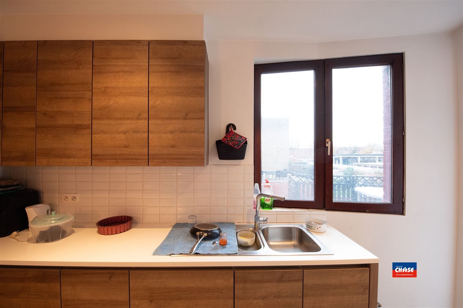 Handelshuis met groot appartement, garage en tuin foto 33